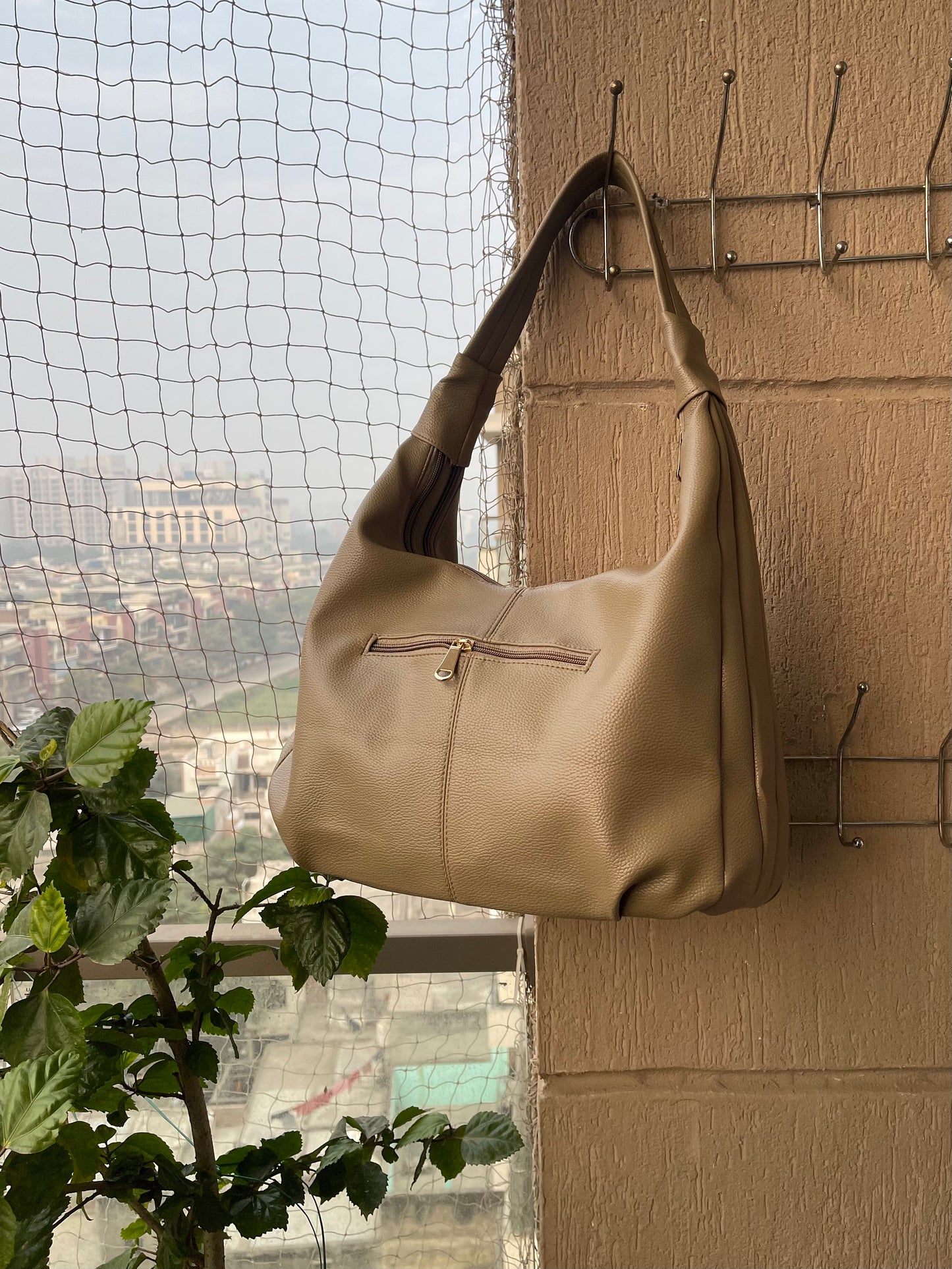 Effortless Style in a Timeless Beige Handbag