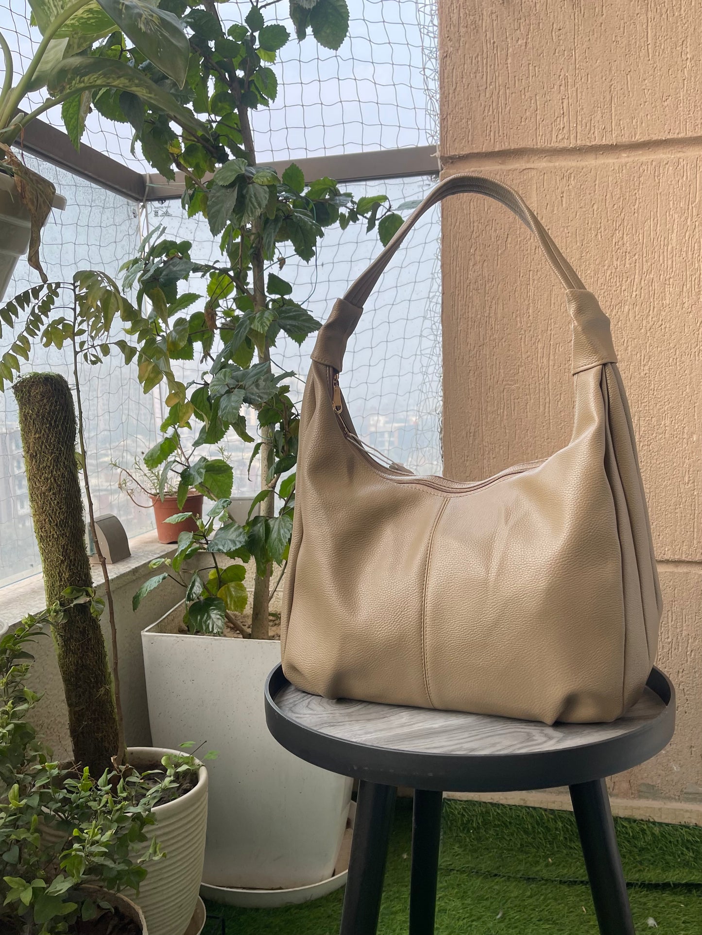 Effortless Style in a Timeless Beige Handbag