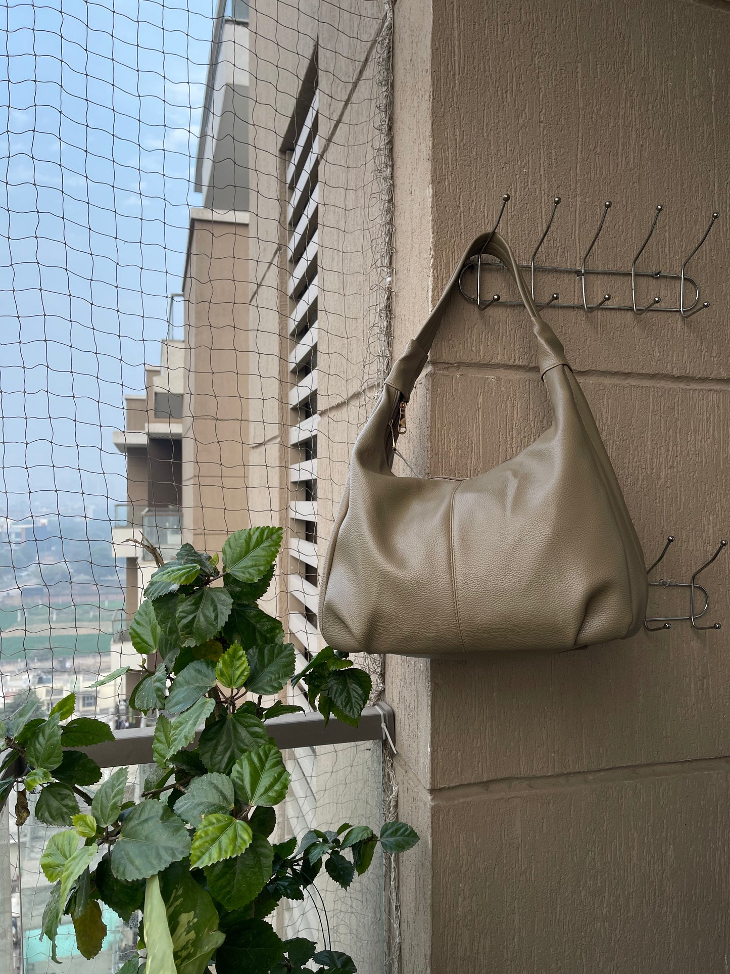 Effortless Style in a Timeless Beige Handbag